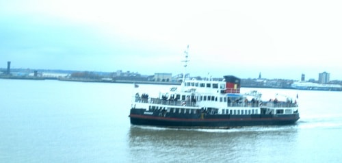 MV Snowdrop (one of the iconic Mersey Ferries) on the River Mersey with Liverpool skyline in the background