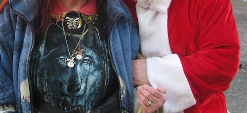 Leonora Brace and councillor Adrian Jones as Father Christmas in Birkenhead
