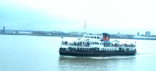 MV Snowdrop (one of the iconic Mersey Ferries) on the River Mersey with Liverpool skyline in the background